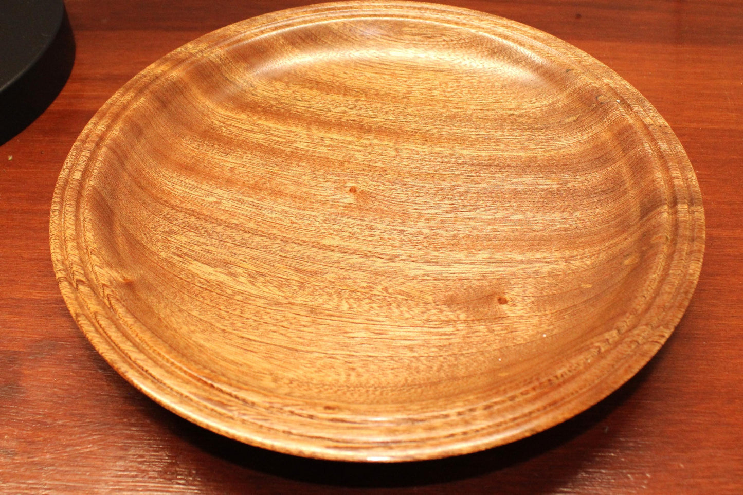 Hand turned sapele dish. Chatoyance throughout, one of a kind piece for home decor or gift