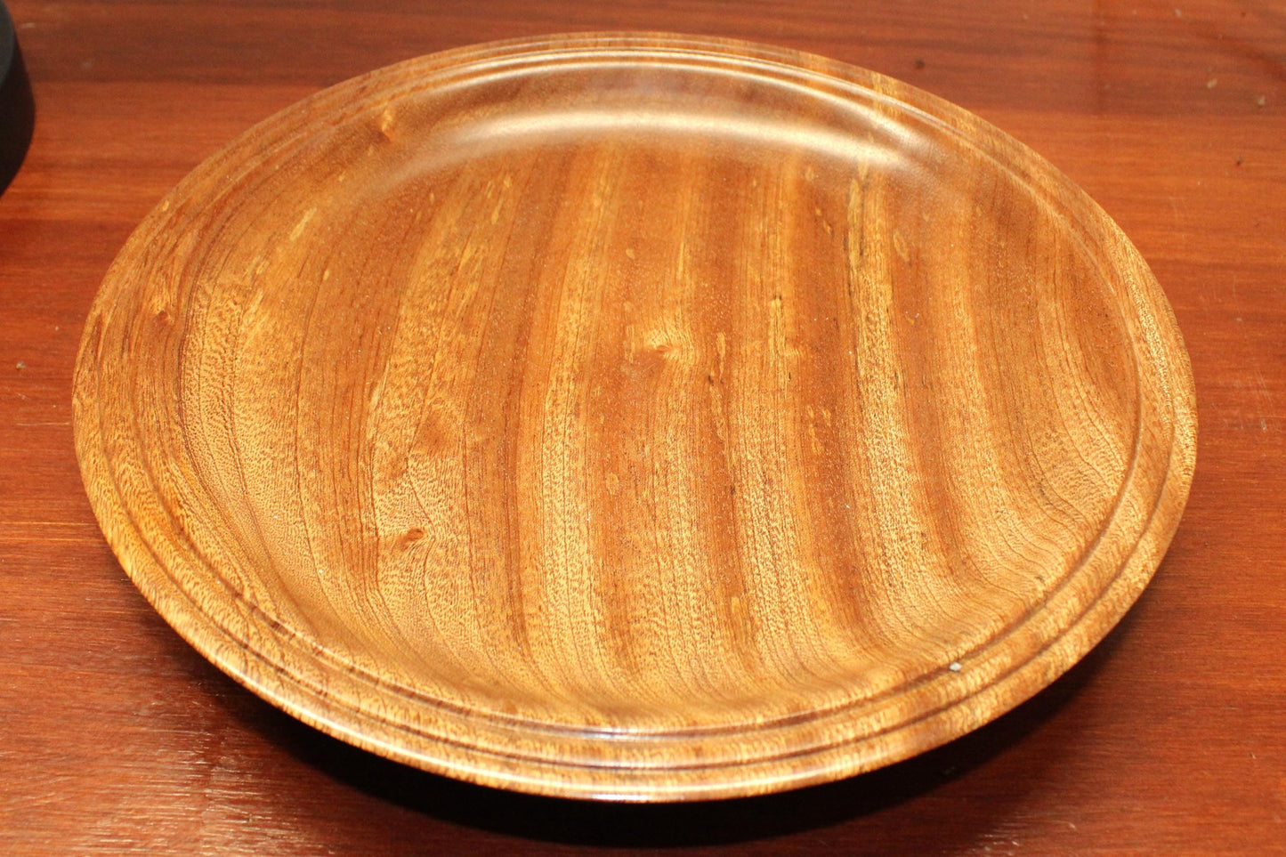 Hand turned sapele dish. Chatoyance throughout, one of a kind piece for home decor or gift