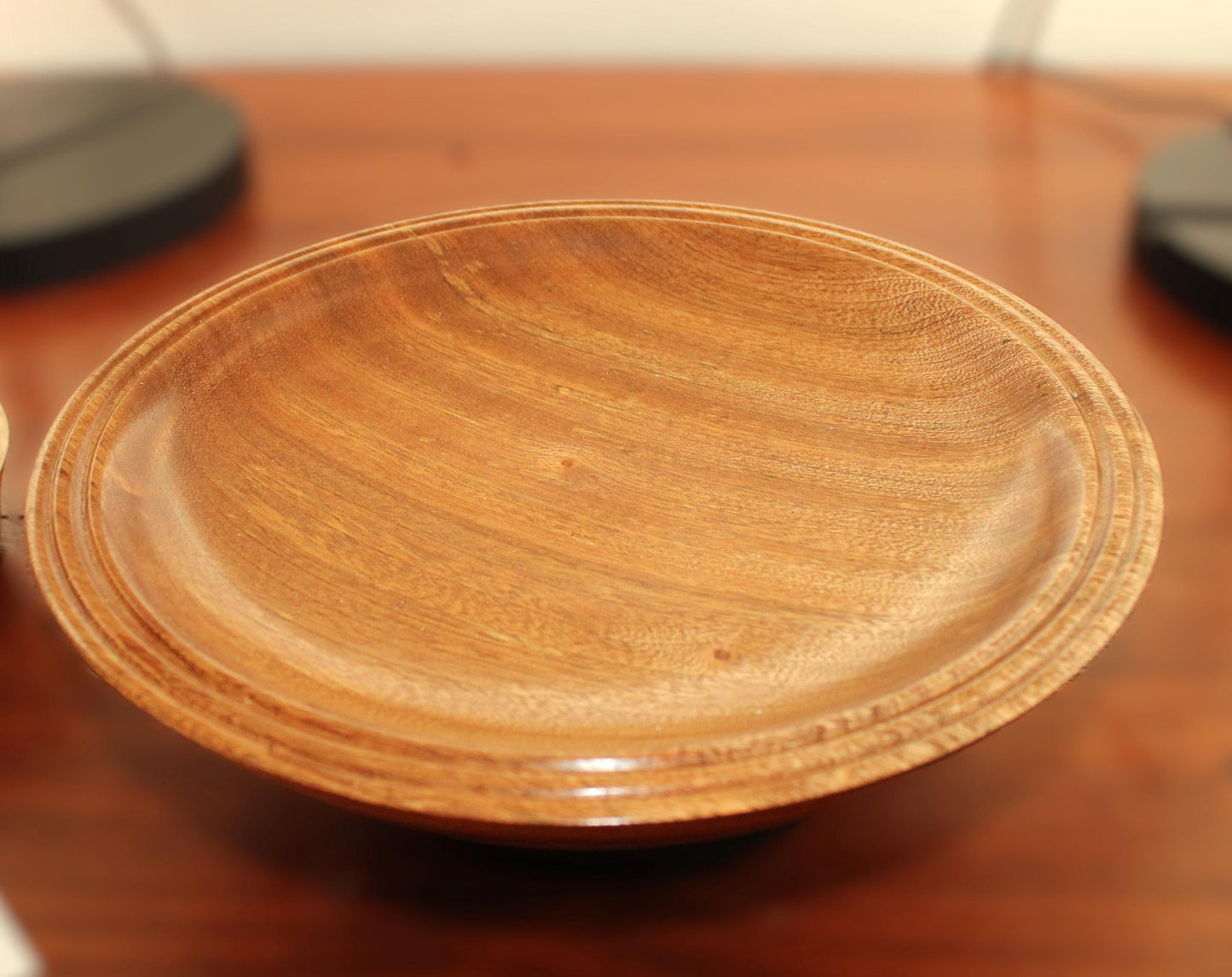 Hand turned sapele dish. Chatoyance throughout, one of a kind piece for home decor or gift