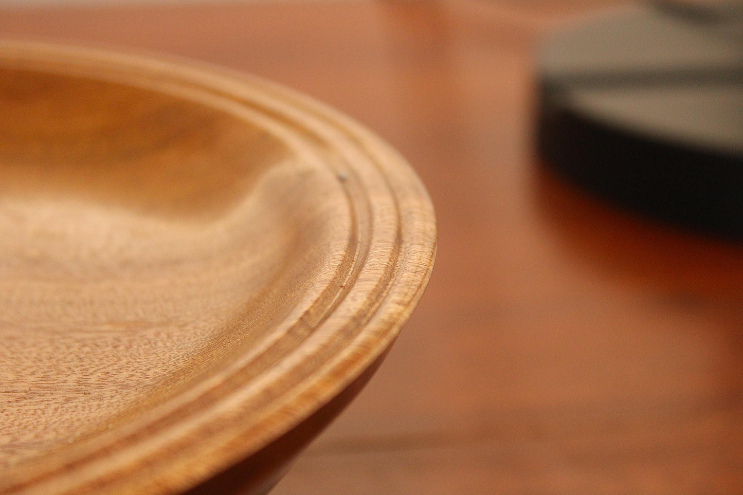 Hand turned sapele dish. Chatoyance throughout, one of a kind piece for home decor or gift